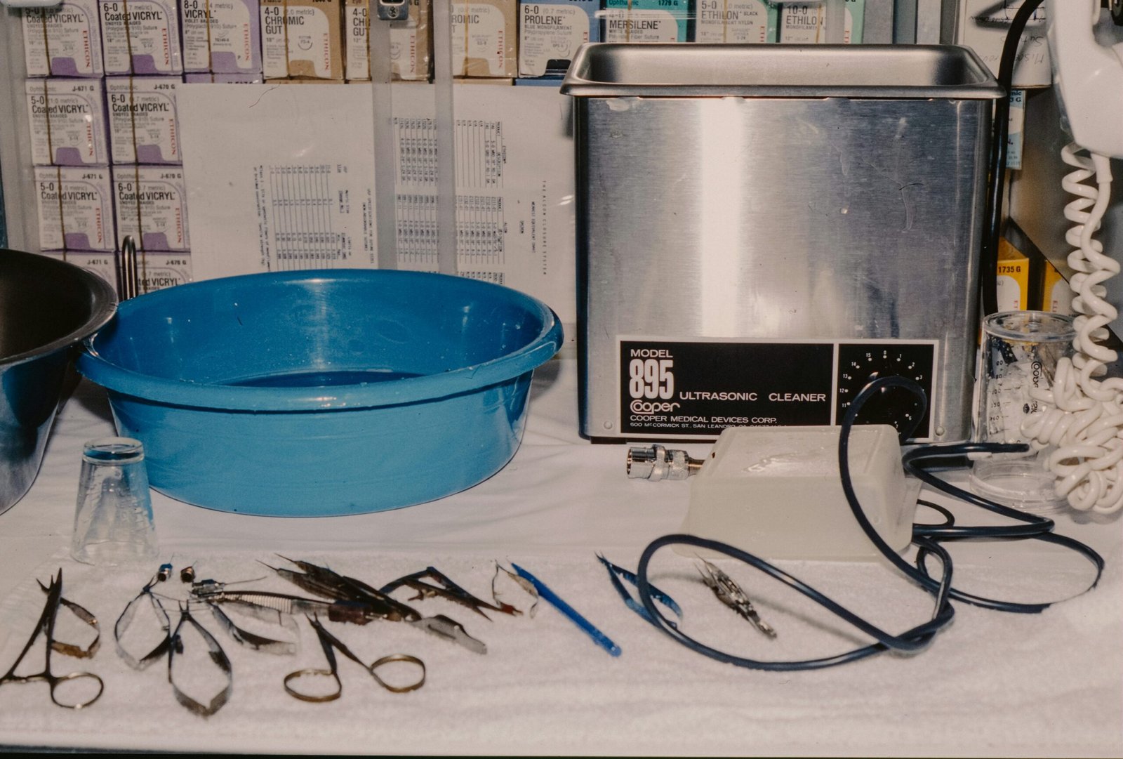 Surgical instruments and sterilization equipment on a clinical work surface